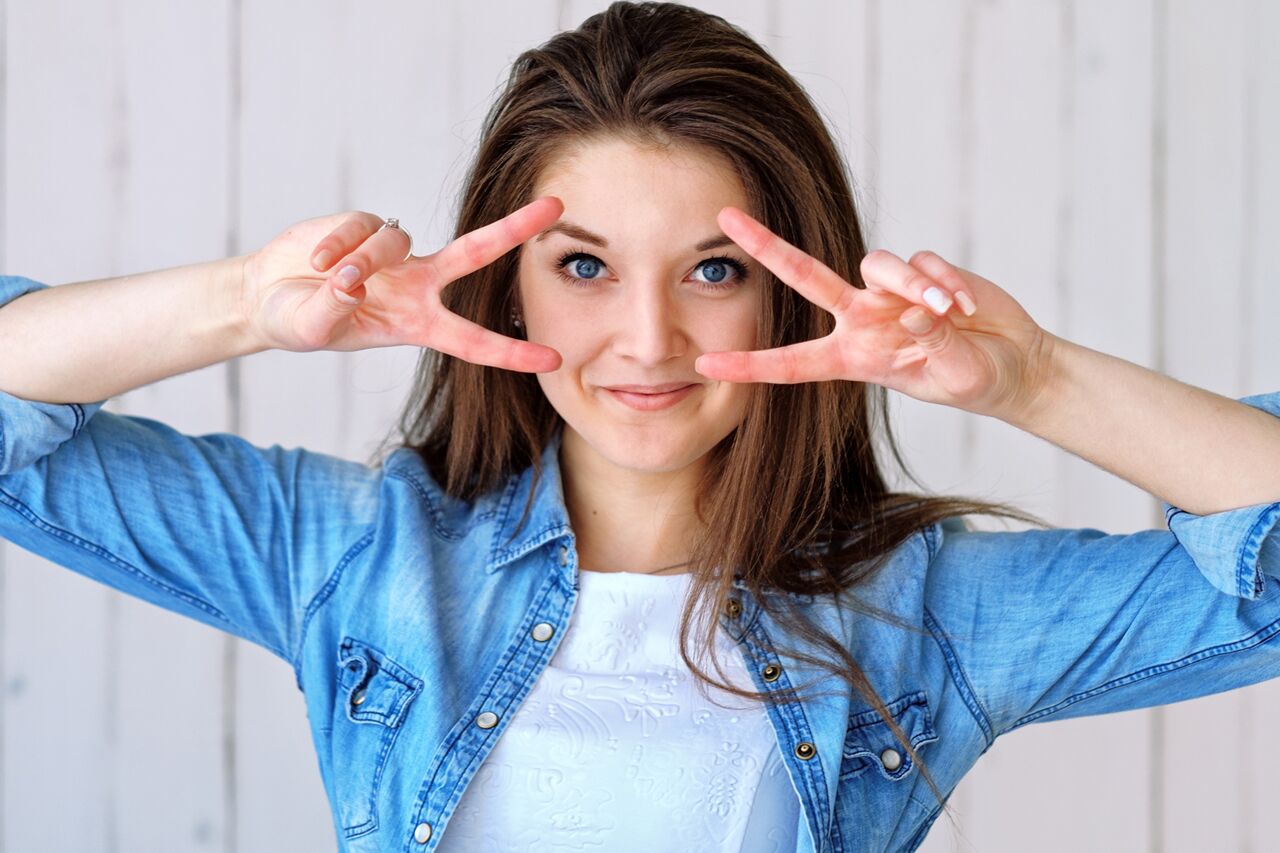 Happy Girl Fingers Near Eyes 1280x853
